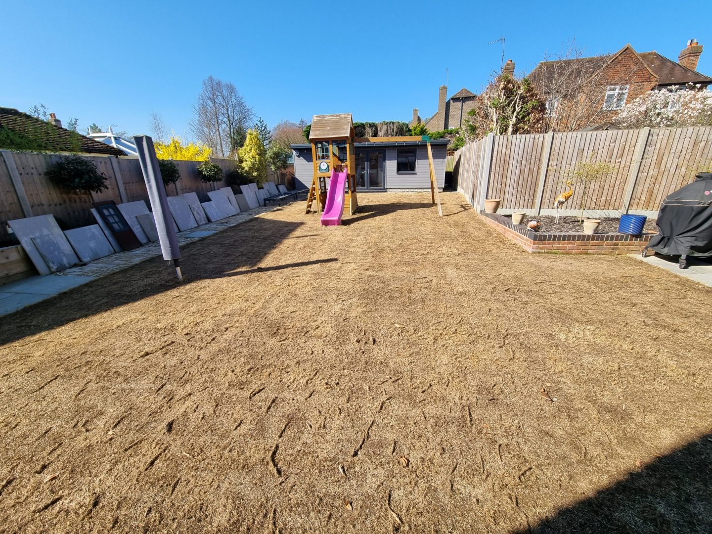 lawn_booster_renovation_wateringbury_lawn_scarifying_seeding
