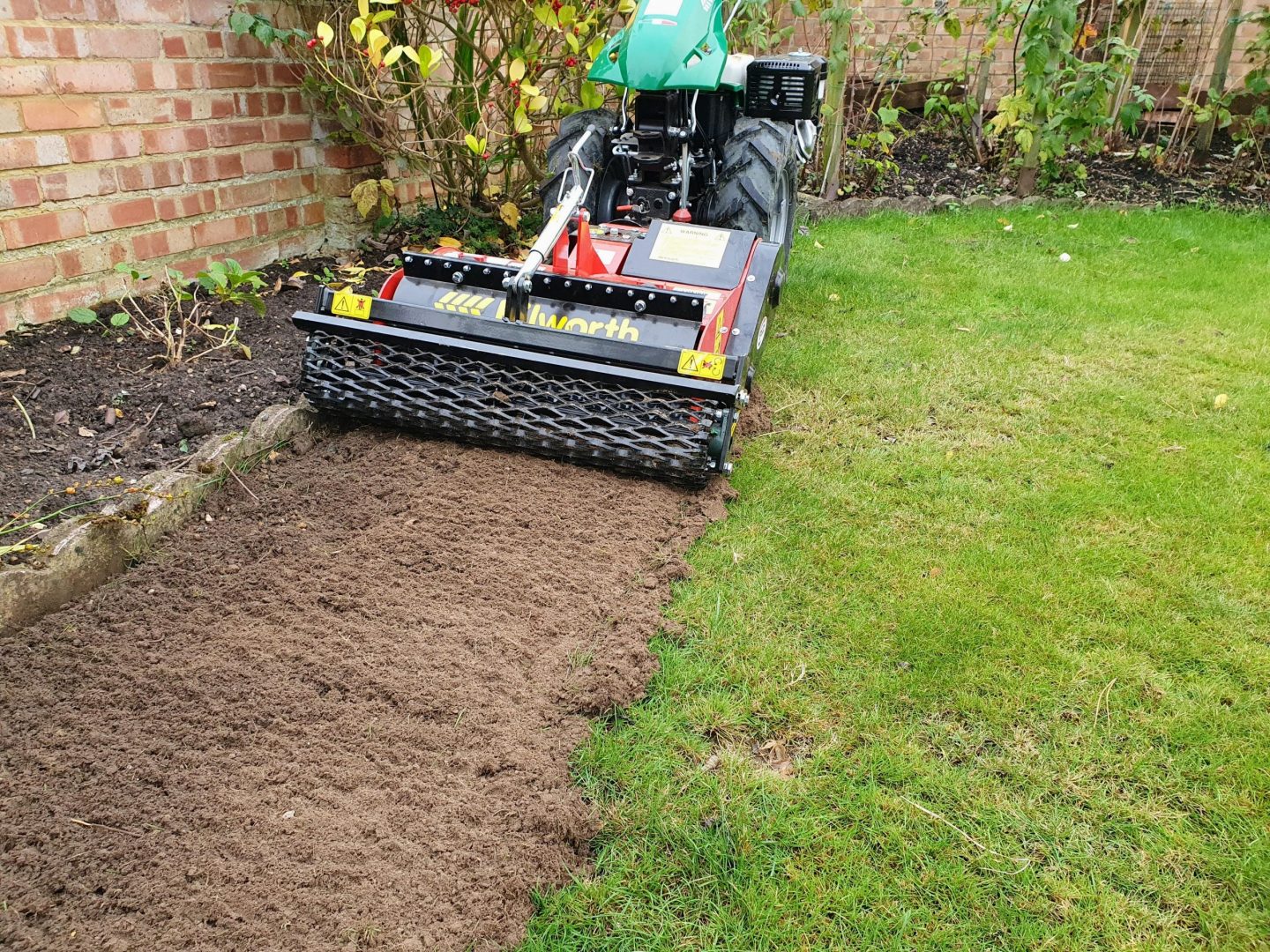 stone-burier-preparing-ground-for-turfing-kent